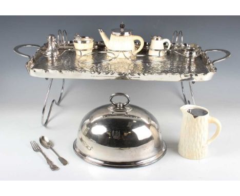A Hukin &amp; Heath plated breakfast set, the two-handled rectangular tray with folding legs and a wirework frame forming two