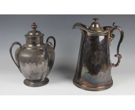 A Victorian James Dixon &amp; Sons plated 'Self-Pouring Teapot', the domed lid with turned wood finial above an ovoid body wi
