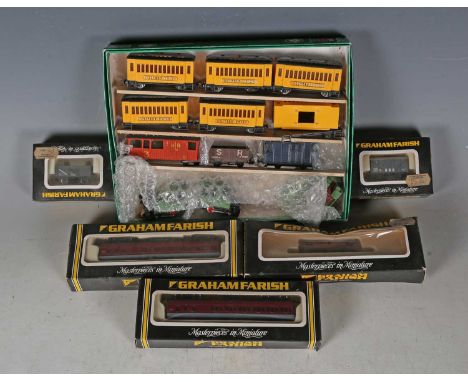 A collection of N gauge railway items, including Hornby Minitrix No. 205 2-6-2 tank locomotive, Graham Farish No. 3106 0-6-0 