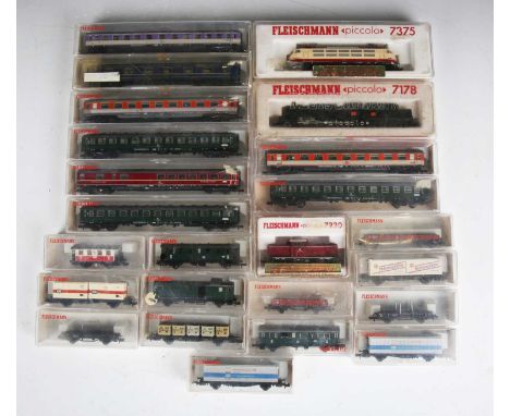 A collection of N gauge railway items, including Fleischmann Piccolo No. 7175 2-10-0 locomotive and tender SNCF, three tank l