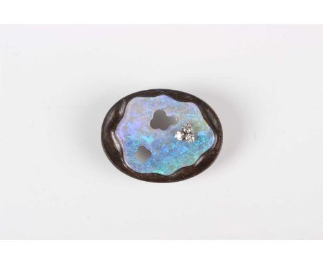 A Grima gold, boulder opal and diamond oval pendant brooch, mounted with three circular cut diamonds, detailed ‘Grima 0.750 A