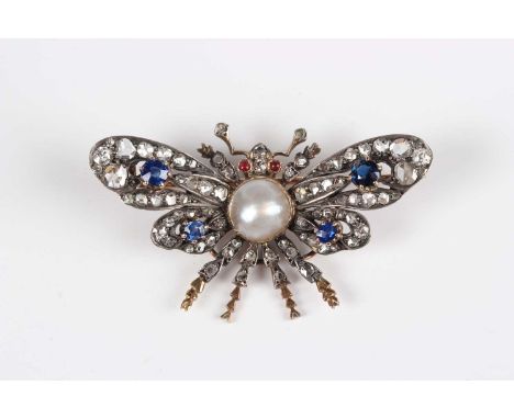 A late Victorian gold backed and silver set, diamond, sapphire, half-pearl and cabochon red gem set brooch, designed as a but