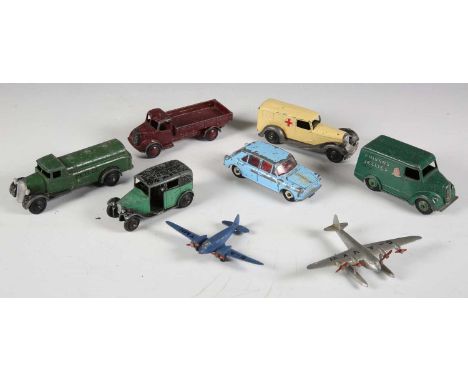 A small group of Dinky Toys vehicles, including 25 Series petrol tanker, No. 452 Trojan van 'Chivers Jellies', No. 30f ambula