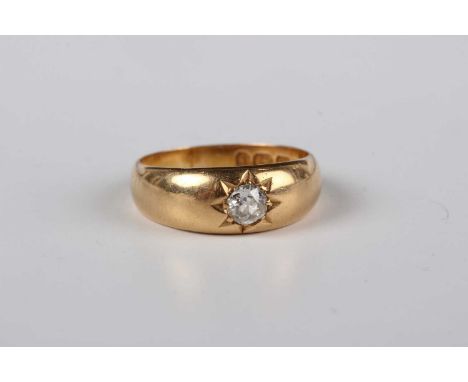 A Victorian 18ct gold and diamond single stone ring, star gypsy set with a cushion shaped diamond, Birmingham 1893, weight 3.