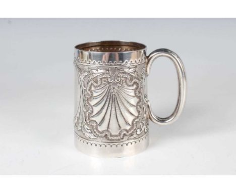 A late Victorian silver christening tankard of tapering cylindrical form, chased and embossed with a foliate framed vacant ca