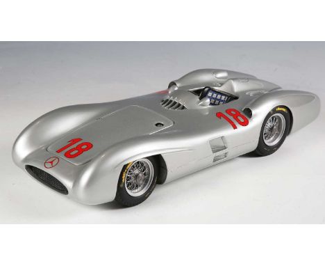 A resin and diecast model of a Mercedes-Benz W196R racing car with streamliner body and race number 18, length 43cm (faults).