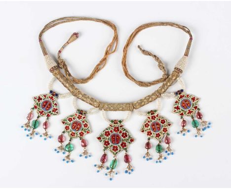 A late 19th century Indian gold and enamelled Kavach Vishnupada pendant necklace, the front hung with five gold lobed palmett