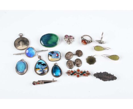 A group of mostly silver jewellery, comprising seven brooches a pair of cufflinks, two rings, four pendants, a pendant locket