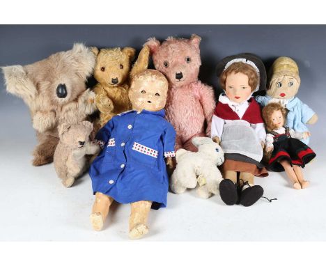A Chad Valley felt doll with painted features, height 48cm, wearing Welsh national costume, together with two other dolls, a 