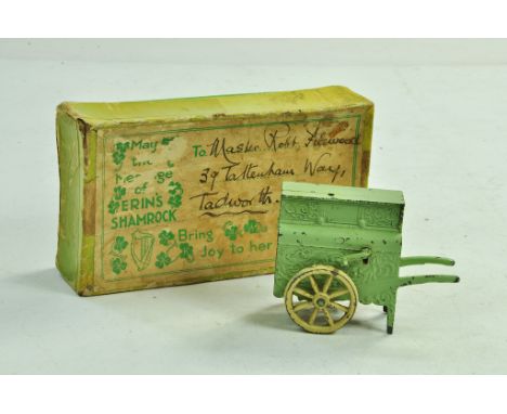 Mickey Mouse Organ Grinder from Charbens, in green. Fair to good with fair box.