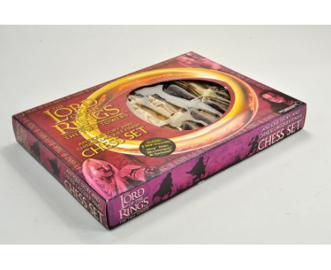 Lord of the Rings LOTR collectables comprising Ivory and Laquer Finish The Two Towers Chess Set. Appears unused. 