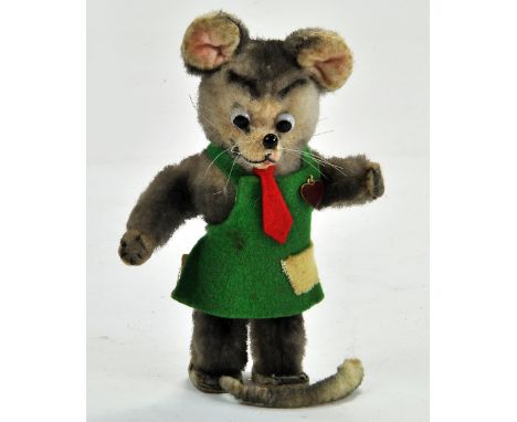 A vintage Berg Rare old Austrian Mohair Mouse, dressed in green felt apron and tie, red enamel and brass Berg Heart tag attac