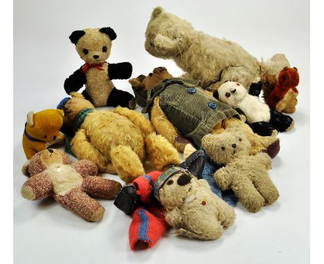 A very well loved group of bears and other stuffed animals possiby inclusive of Steiff and various British makers. 