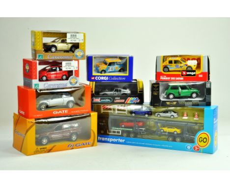 A group of diecast issues comprising Corgi, Gate, Cararama and others including Tesco Car Transporter Set. All excellent with