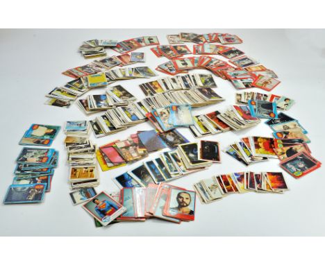 A large collection of vintage TOPPS trading cards comprising many dozen examples relating to Superman, Battlestar Galactica, 