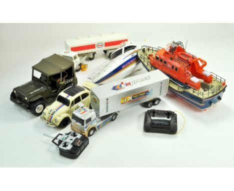 A group of larger scale toys including RC issues, RNLI Lifeboat and others.