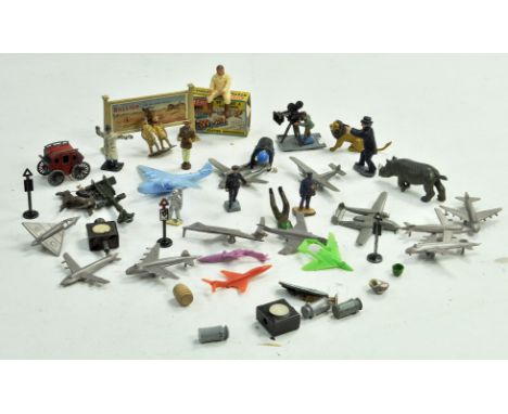 An assortment of plastic and metal figures including miniature plastic aircraft, Corgi accessory items and others. 