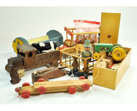 A group of mostly vintage wooden toys including Taylor Toy Tractor, Lorry and others.