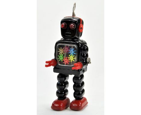 Japanese Tinplate Battery Operated Walking Robot. Toy is working and appears very good to excellent.