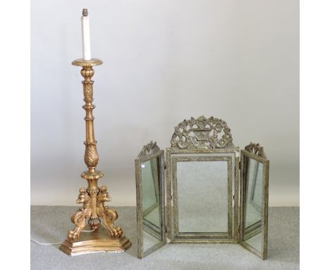 A gilt painted altar stick, 135cm tall, together with a triple dressing table mirror