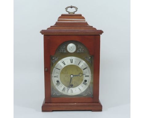 A mahogany cased bracket clock, the brass dial signed Tempus Fugit, 39cm tall