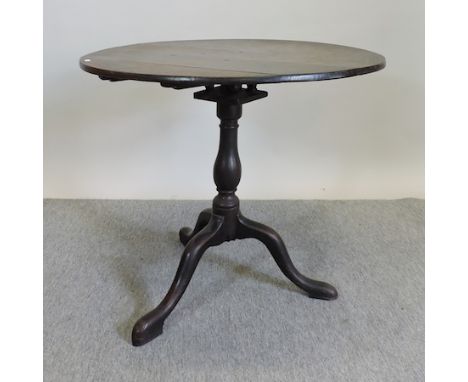 A George III mahogany tripod table, with birdcage action, 80cm