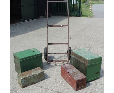 A large metal sack barrow, together with a painted metal trunk, another similar and two ammunition boxes
