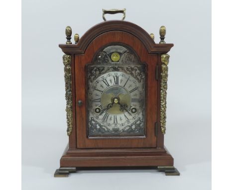 A Warwick walnut cased bracket clock, with Westminster chimes, 25cm tall