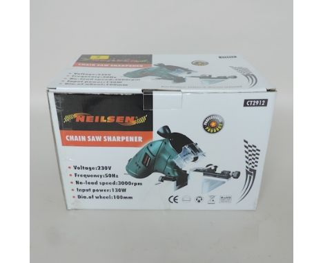 A chainsaw sharpener