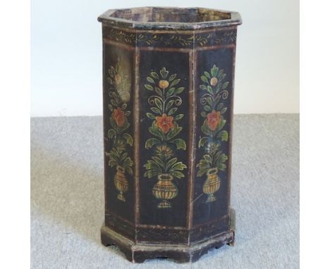 A black and floral painted octagonal stick stand, 50cm tall