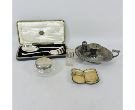 A pair of silver plated servers, cased, together with a plated chamber stick, two silver topped glass jars and a silver cigar