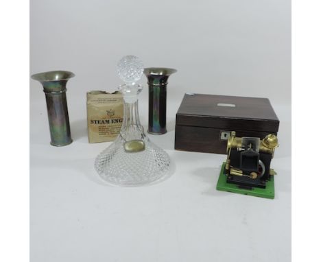 A Victorian rosewood writing slope, 27cm, together with a stationary steam engine, two trench art vases and a ship's decanter
