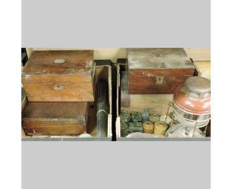A collection of four Victorian stationery boxes, together with stone inkwells and an oil lamp