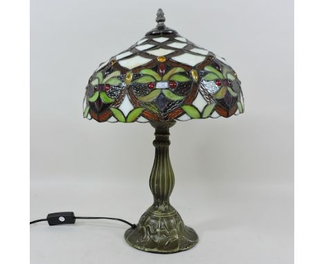 A Tiffany style table lamp, with a coloured glass shade, 44cm tall