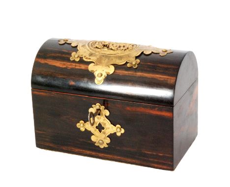 A 19th Century coromandel tea caddy, the domed cover with applied brass mount in the Gothic manner with a relief deer hunting