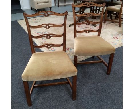 A set of six Regency style mahogany dining chairs, the pierced ladder backs above stretcher frames. (6) 