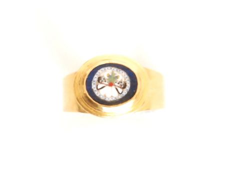 A 19th Century 22ct micromosaic ring mounted with an oval panel depicting a butterfly against a white ground with millefiori 