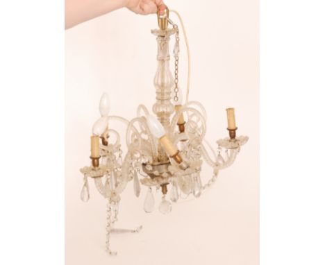An early 20th Century Venetian style clear glass ten branch chandelier together with sconces and shades, diameter 52cm