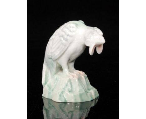 A Royal Worcester Netsuke modelled as a black cockerel and heightened in green, green printed mark with date code for 1933, h