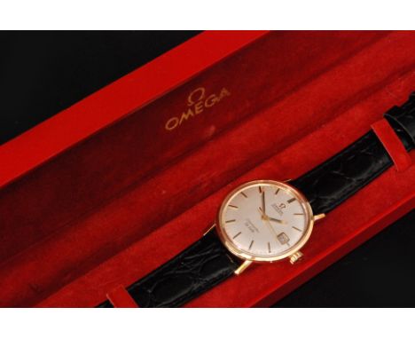 A 9ct Gentleman's Omega De Ville Seamaster automatic wristwatch with silvered dial and gilt baton markers, sweep seconds hand