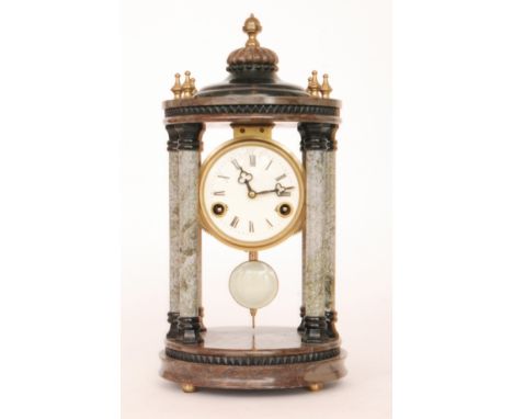 A 20th Century marble effect six pillar mantle clock in the classical style, suspended circular striking eight day movement b