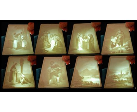Eight 19th Century KPM Berlin trapezoid shaped lithophane panels comprising two rural landscapes (one indistinctly titled), o