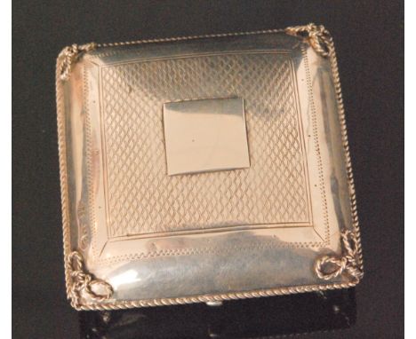 A mid 19th Century Russian silver box modelled in the form of a cushion with rope twist border and ribbon tied corners, engin