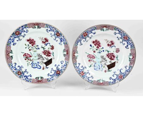 Two large 18th century Chinese porcelain Family Rose plates with floral/vase/scroll painting decor. Both hairline + chip. Dim