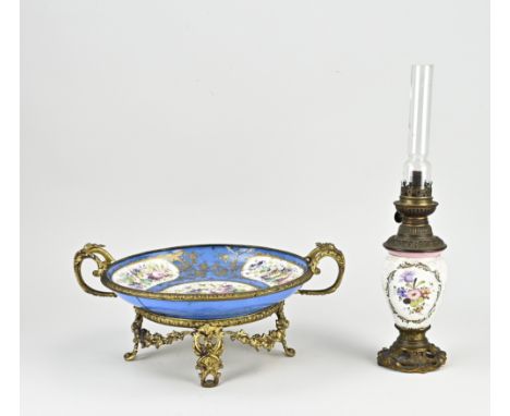 Two parts 19th century French porcelain. 1x Sevres tazza with gold-plated brass, hairline cracks. 1x Oil lamp with floral/fig