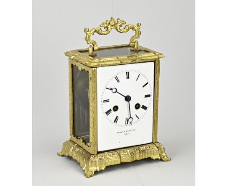 Antique French gilt brass table clock with enamel dial, eight-day movement, half-hourly strike on bell and string pendulum. D