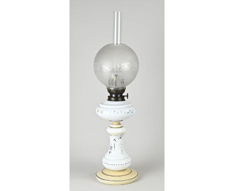 Antique hand-painted opaline glass kerosene lamp with floral decor. Circa 1900. Dimensions: H 60 cm. In good condition.