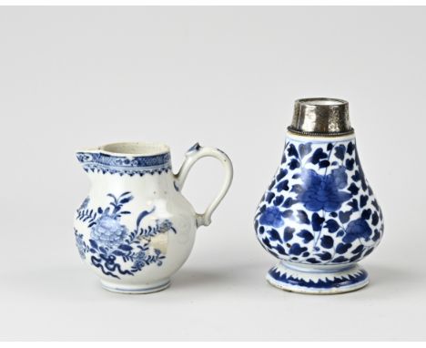 Two pieces of 18th century Chinese porcelain. Consisting of: Queng Lung milk jug, bottom handle is missing + hairlines in gla