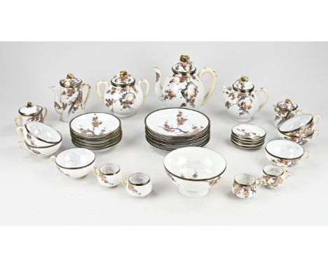 Antique Japanese tea set. Circa 1930. Consisting of: teapot, sugar bowl, two milk jugs, mocca jug, cream bowl, six plates, te