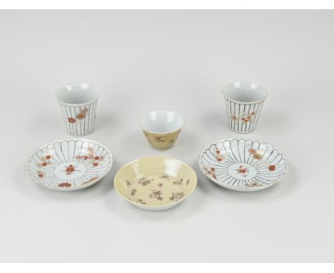 Three antique Chinese porcelain cups and saucers. 18th - 19th century. Two parts milk and blood with gold decor, floral, 18th